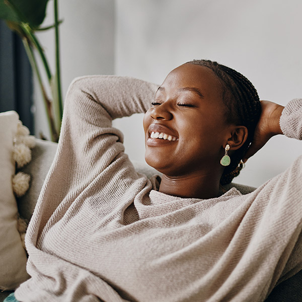 woman resting her head on her hands